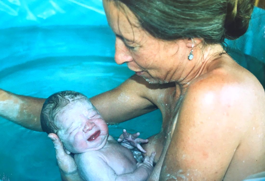 Midwife Diana Fern at the birth of her son, Leo, in birthing tub